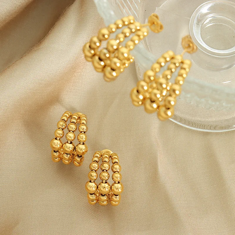 Golden Plated Steel Ball Earrings with Unique Design