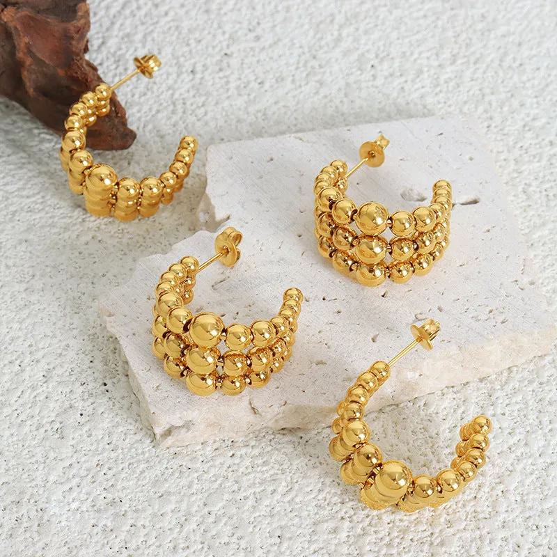 Golden Plated Steel Ball Earrings with Unique Design