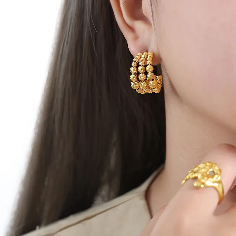 Golden Plated Steel Ball Earrings with Unique Design