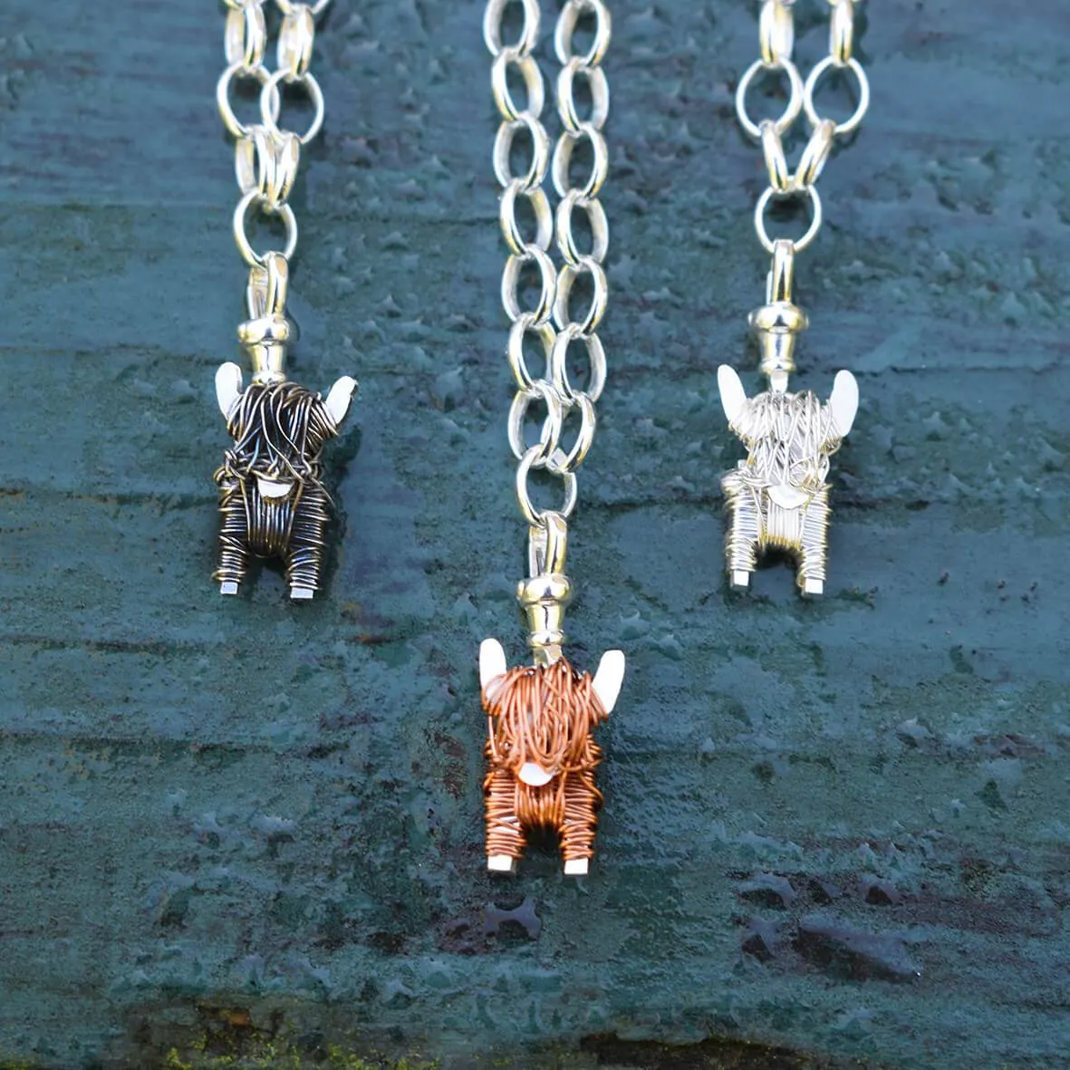 Silver and copper Highland Cow charm