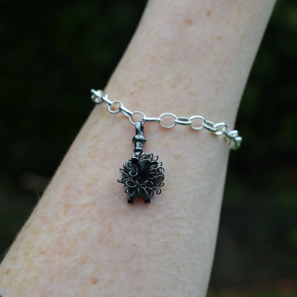 Silver black sheep charm