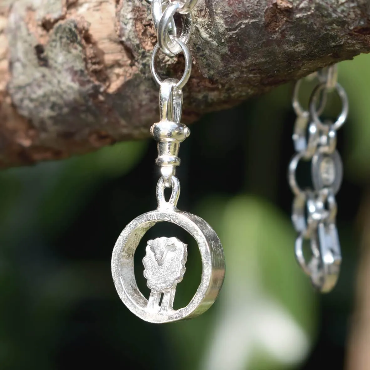 Silver circle sheep charm