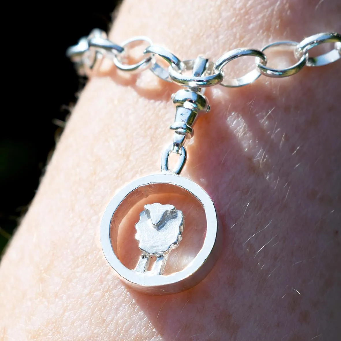 Silver circle sheep charm