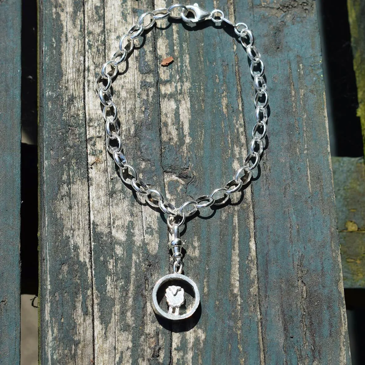 Silver circle sheep charm