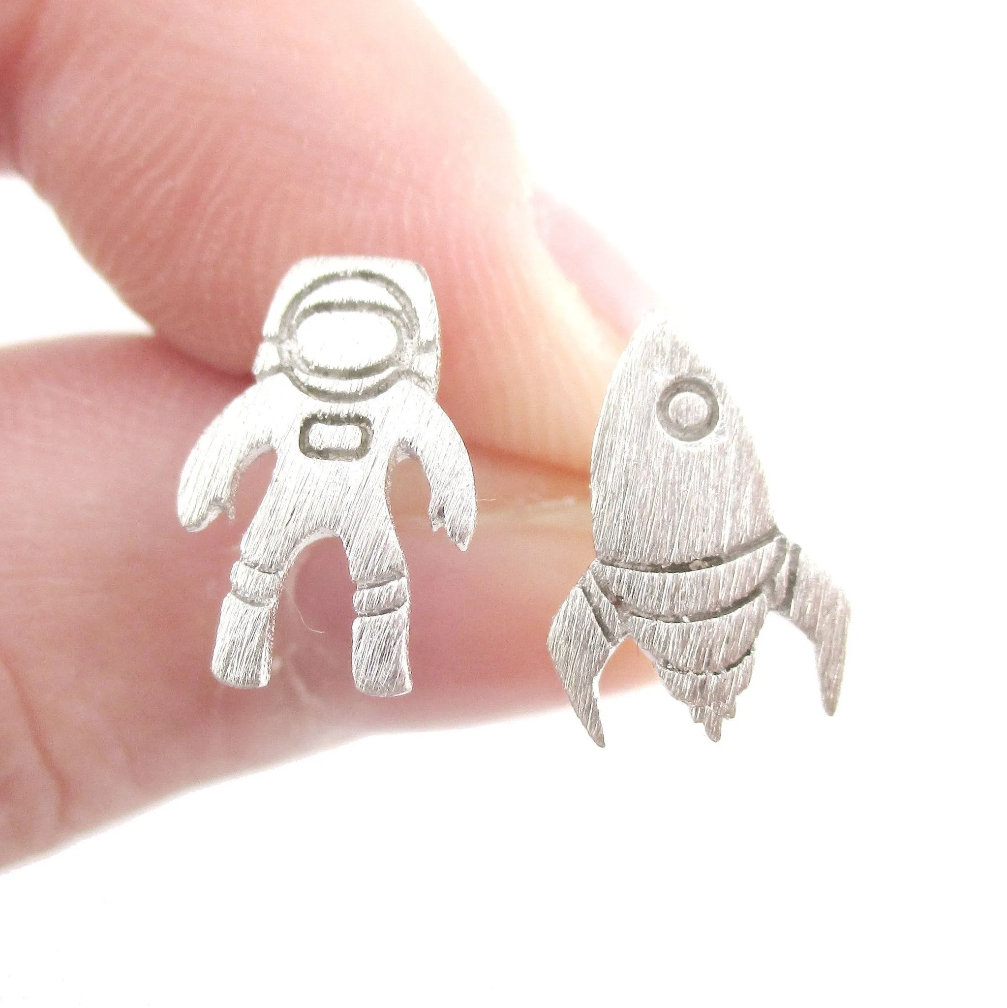 Spaceship and Astronaut Space Travel Themed Stud Earrings in Silver | DOTOLY